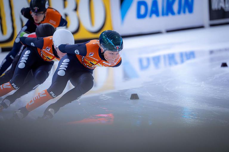 Short Track skater wearing Skate-Tec Helmet 025 Visor in action